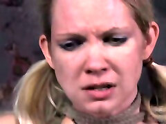 Pigtailed blonde gets her tits tortured in BDSM scene