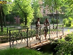 Hot tanned Russian teen Sarah walks around big fountain with her boy
