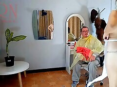 Do you want me to cut your hair? Stylist&039;s client. grand pappa with small girl hairdresser. Nudism 12