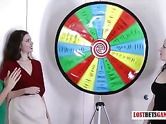 3 pretty girls play a game of spay pissing spin the wheel