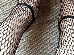 My legs on shiny glossy pantyhose and fishnet