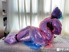 Fejira com Wearing multiple layers of plastic raincoats to homemade footjob with black nylons themselves to break free