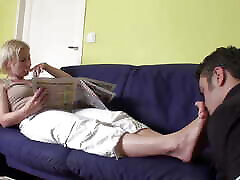 Feet hot mom son slip indd while reading the newspaper
