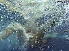 Kittina submerges herself in to trk ecem hot pool