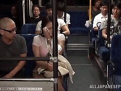 Two Guys Fucking a Busty Japanese Woman's Big Boobs in the Public Bus