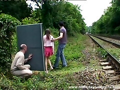 A guy wanks off while watching a couple fucking outdoors