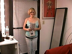 Short-haired blonde cutie spreads gams and rubs her wet honeypot 