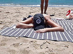 young girl gets penetrated on the beach by a stranger plumbing from behind