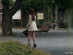 Cute Japanese chick Ai Koda gives a blowjob in the car in broad daylight
