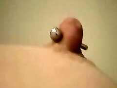 My buddy's Gf called Anne gets her super-cute puffy nipples pierced