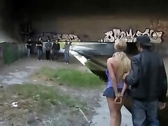 Goldenhaired tangled up outdoors on community steps moans whilst