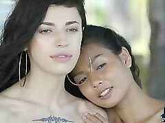 Petite Asian and Russian teenie lesbians outdoor posing