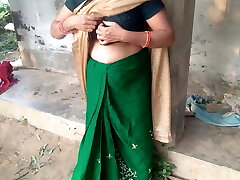 Desi Indian Milf with a big ass milks her own knockers in a farmhouse