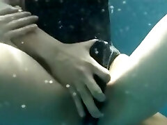 Navy swimsuit underwater play