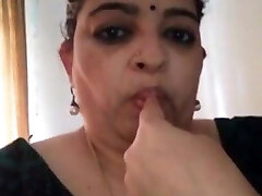 Desi Aunty showing how to fellate Dick...