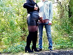 MILF in leather microskirt gets a blast on her ass outdoors