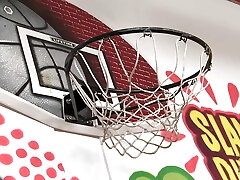Basketball player porks with a hung guy on the court