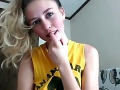 Petite Blond giving herself a fun time on webcam fingering