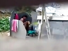 Aunty Bathing Unsheathed at Public Place Aunty Bathing Unsheathed at Public Place