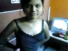 Kinky dark skinned ordinary looking Hindu brunette shows her titties