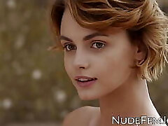 Fantastic redhead teases with her natural tits and soft pussy