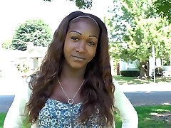 Alluring shemale with long hair posing seductively before tugging