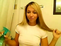 Hot ash-blonde that is uper gives teasing show