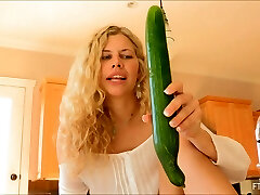 Big green veggie and a beautiful blonde girl nailing
