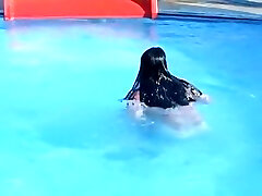 Sweet brunette doll has lost her bathing suit g-string in the pool Sweet brunette doll has lost her bathing suit g-string in the pool