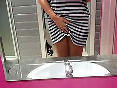 Horny teenie in public restroom – so horny she opens her pussy