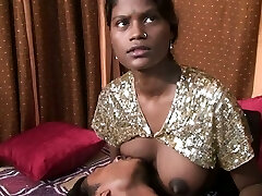 Busty chocolate-colored skin Indian GF squeezing milk out of her juggs