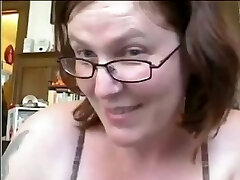 Short haired mature nerdy bitch flashes her gross tits and huge backside