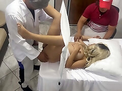 Pervert Poses as a Gynecologist Doctor to Fuck the Beautiful Wife Next to Her Dumb Spouse in an Erotic Medical Consultation