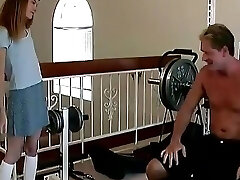 Skinny Barely Legal Slut Deepthroats a Hard Cock on a Weight Bench Then Gets Plumbed