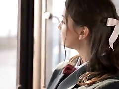 Pretty teenager does blowjob on Japanese bus