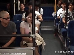 Two Guys Boning a Busty Japanese Dame's Big Boobs in the Public Bus