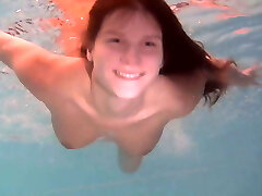 Beautiful exquisite body teen Natalia Kupalka swimming bare