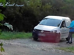 Outdoor camper windows cleaning by the road