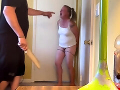 Bad lady gets a paddling