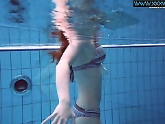 Big bouncing breasts underwater