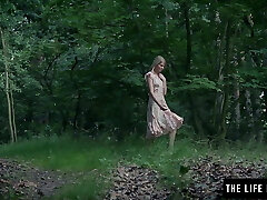 Skinny girl fucks herself firm in the forest