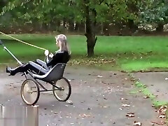 Ponygirl pull the carriage of domme