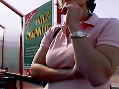 A busty and horny German chick enjoys pleasing her pussy on a picnic