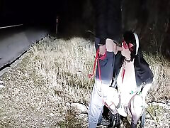 Mom in nun cosplay on leash receives hot cum on face on public road