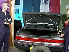 Car mechanic fucks his blonde coworker on the black sofa