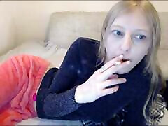 Smoking A hd sex girls on phone In Front Of The Webcam