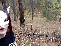 Masked brunette caught in the woods and sucking cock