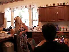 Stepmother seduces her stepson in the kitchen