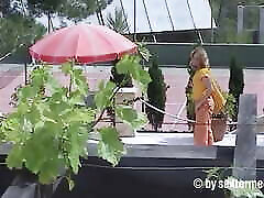 Mature blonde secretly filmed in the garden