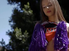 Naughty cheerleader Liza Rowe drops her uniform for a black dick